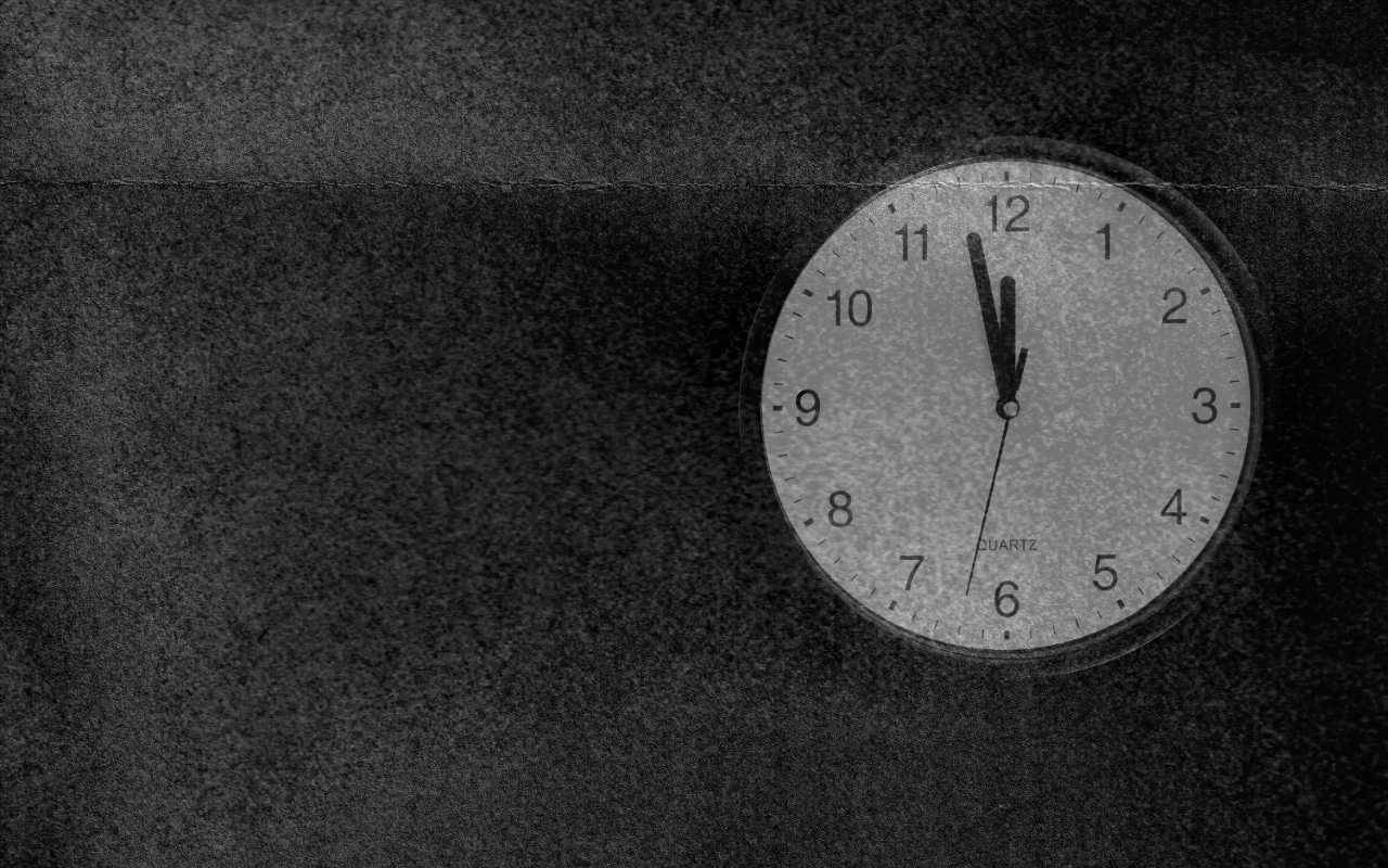 A clock on a grainy texture.
