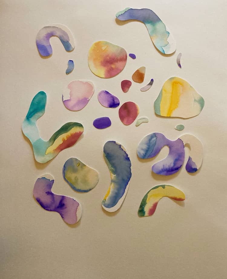 a photo of many different colored watercolor shapes