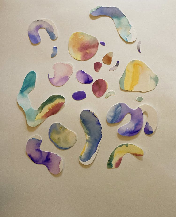 a photo of many different colored watercolor shapes