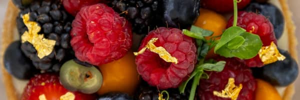 gold leaf on a raspberry