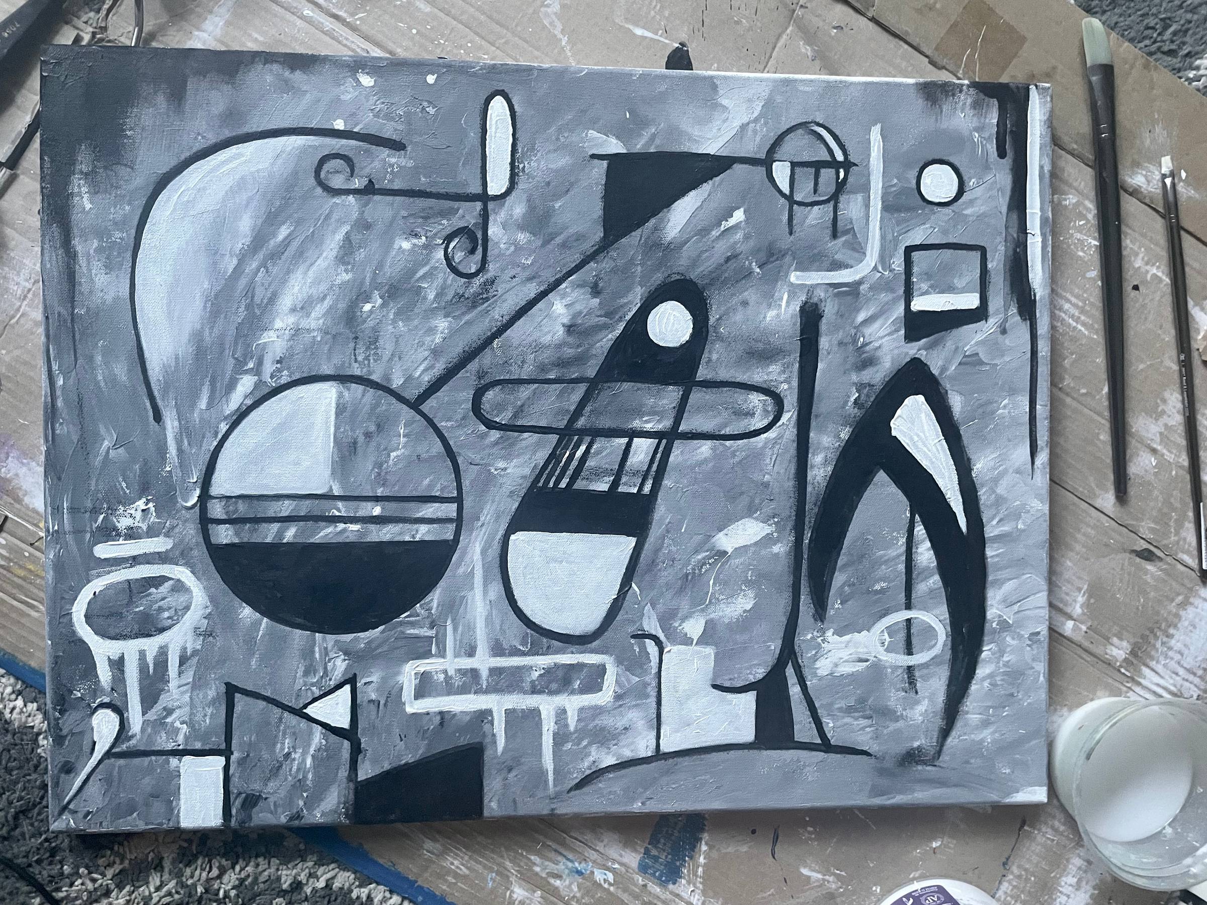 A black and white painting with geometric  shapes over a dappled grey background 