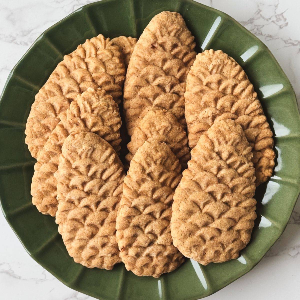 pinecone shaped cookies on a plate
