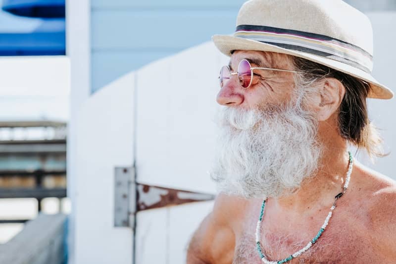 old guy with a beard and hat