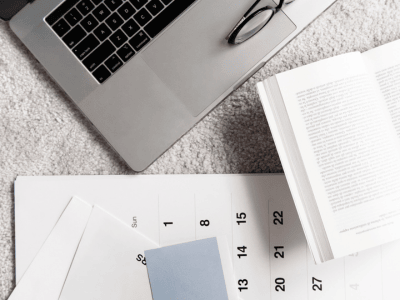 Minimalist summer workspace for introverted entrepreneurs. Focus on slowing down, resting, and working less this summer.