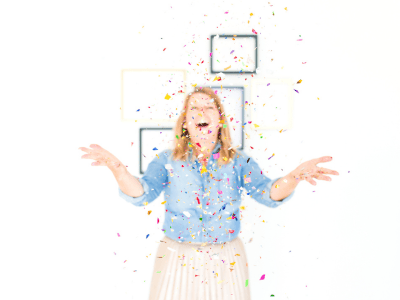 woman throwing confetti