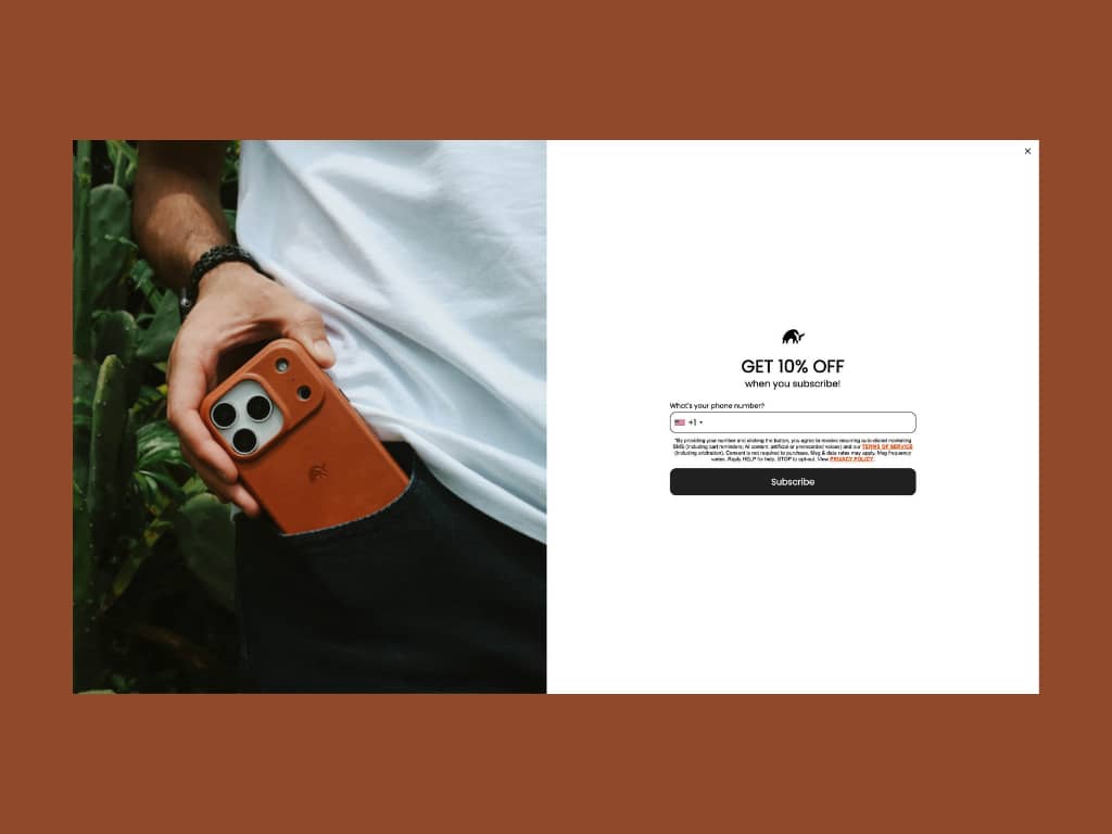 Bullstrap popup offering 10% off discount with phone number collection and SMS consent text