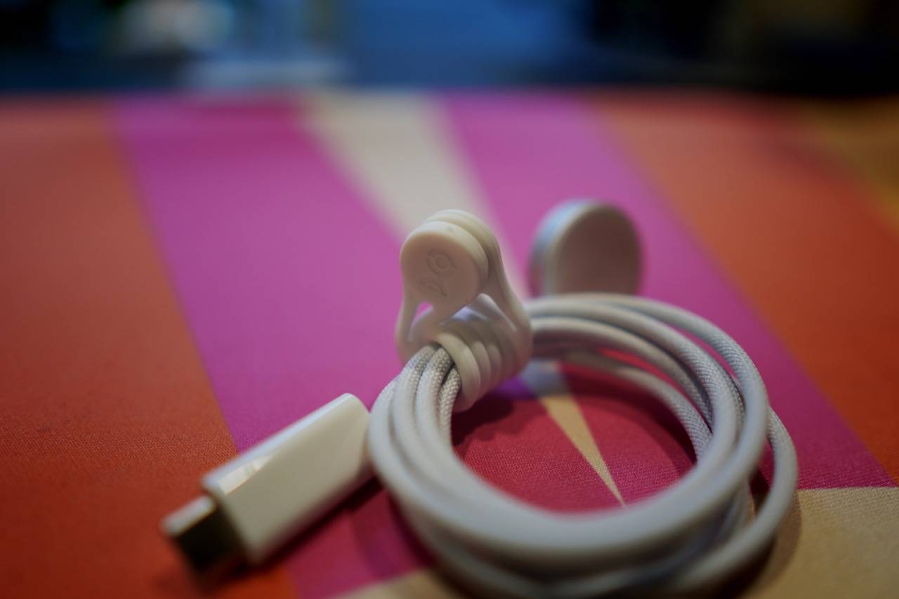 colored desk mat with a white magnetic cable tie