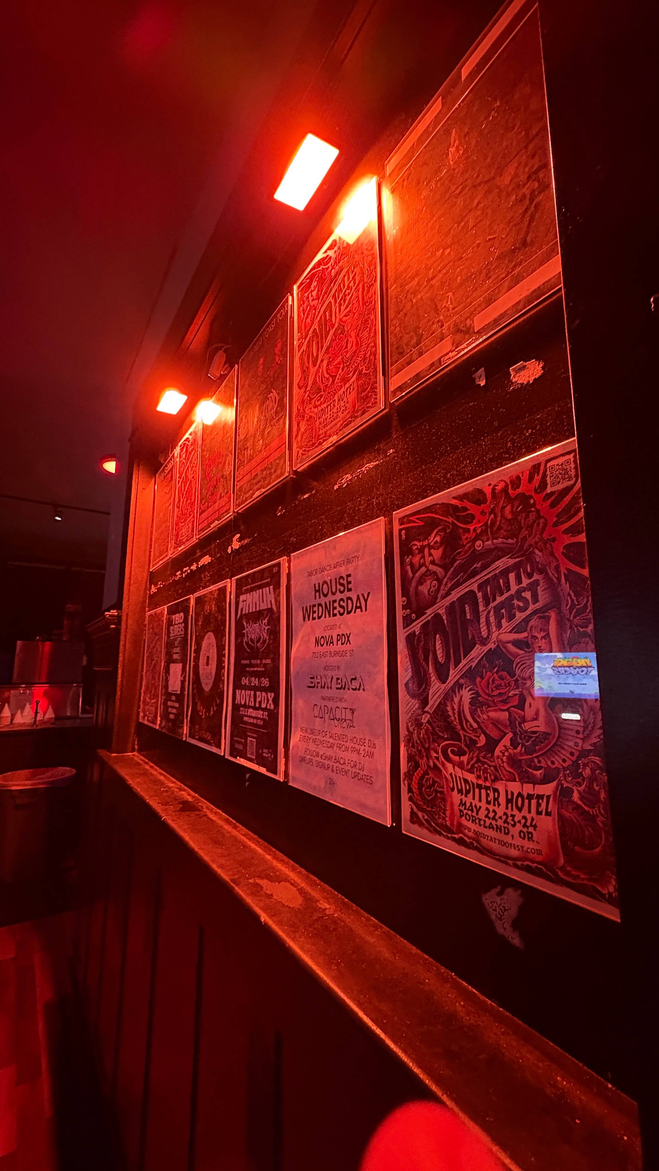 Picture of show promotion posters at a venue