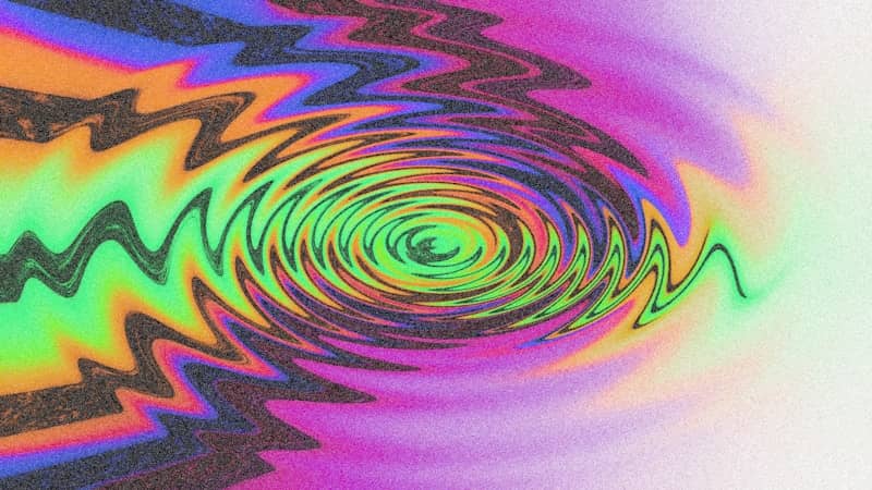 Colorful concentric ripples create a psychedelic effect.