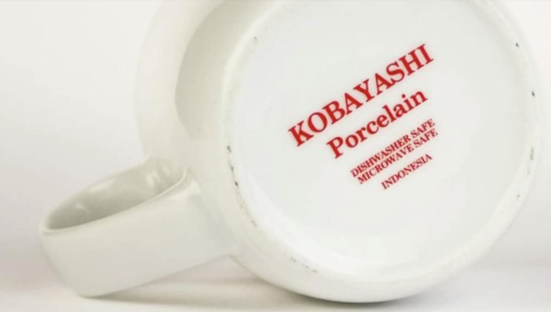 The bottom of a coffee cup, which reads: "Kobayashi Porcelain"