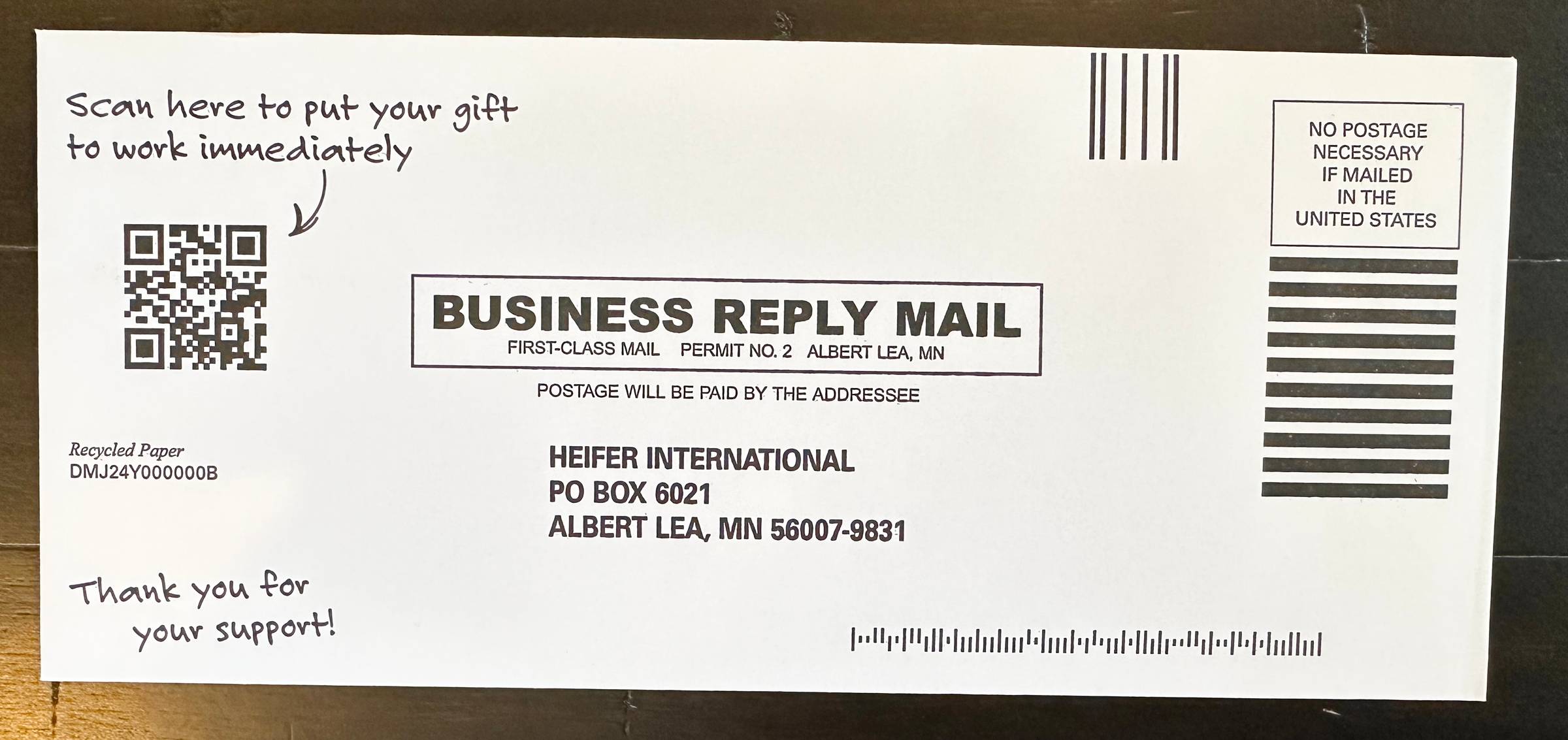 photo of a reply envelope with a QR code