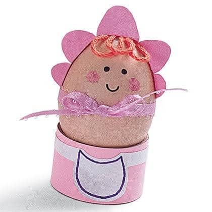 image of an egg decorated to look like a baby for a school project