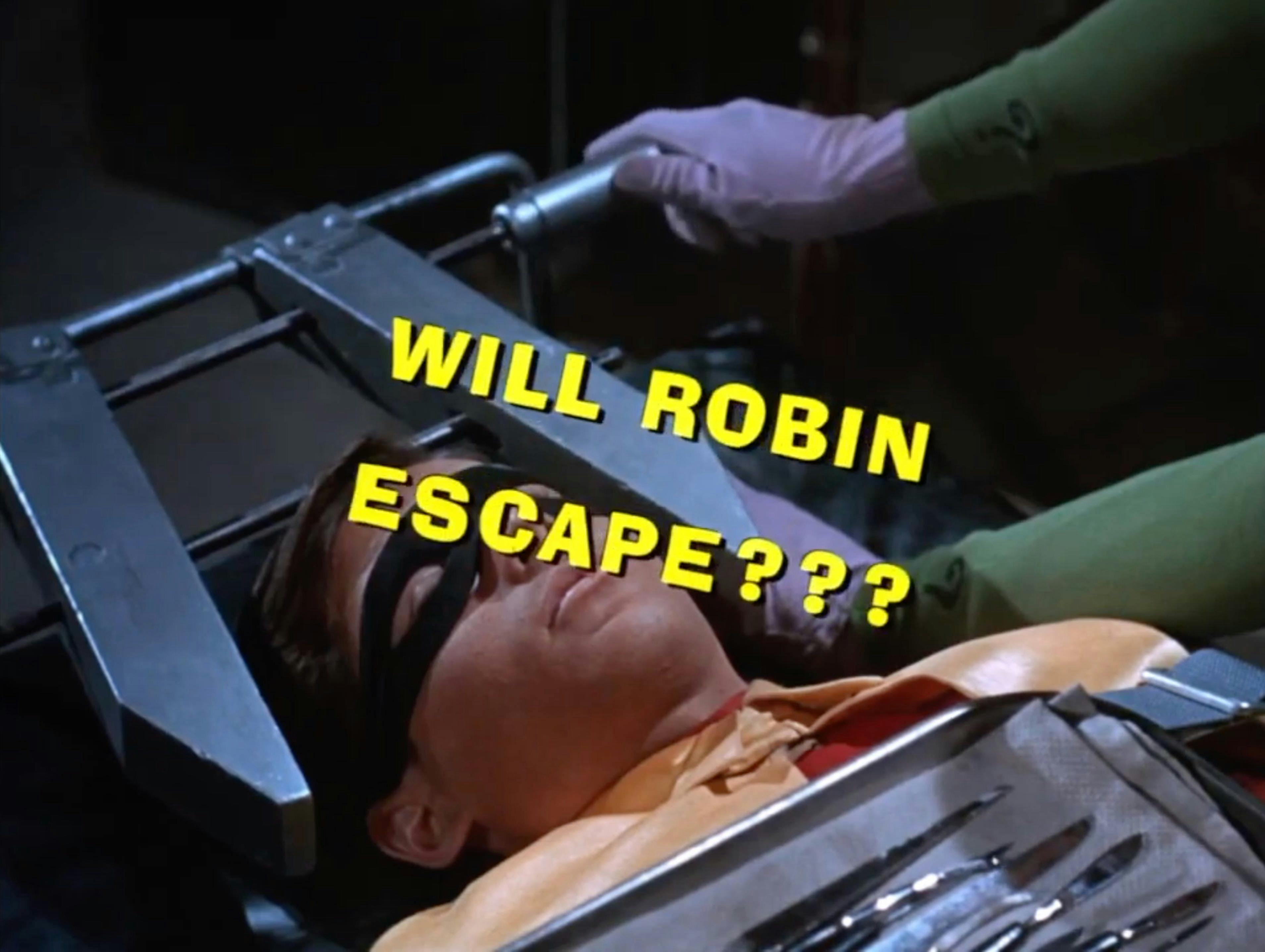 Robin trapped in some kind of torture device by the Riddler, with the words superimposed: "Will Robin escape???"