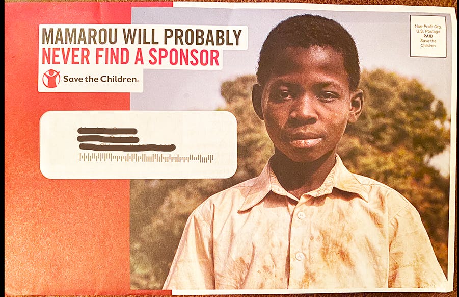 A boy from Malawi, named Mamarou, looks to us with a neutral expression. The envelope reads what is shown above in the text.