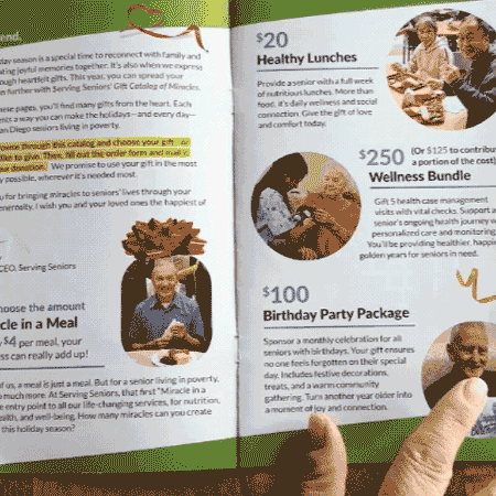 a gif of a someone flipping through a charity gift catalog
