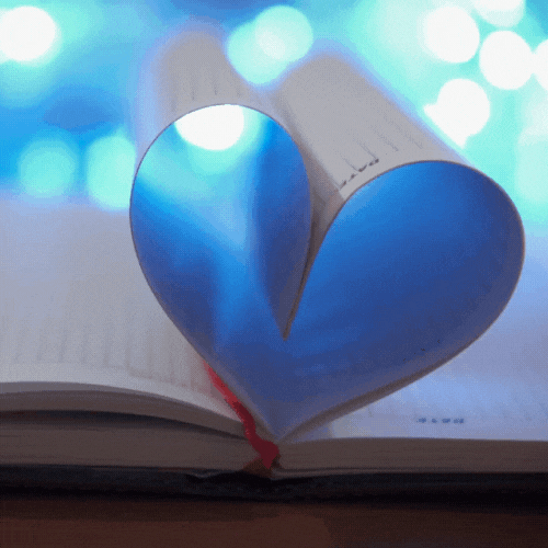 story book with the pages forming a heart shape