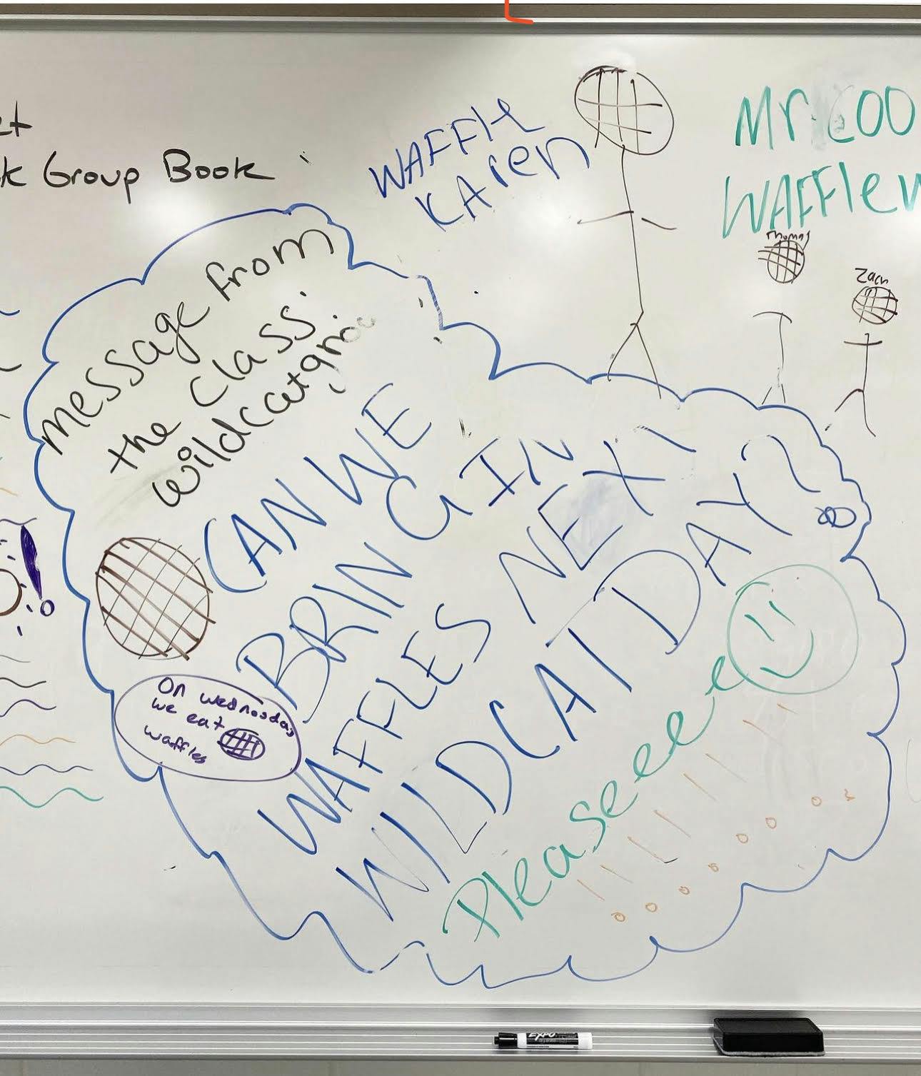 students' writing on school whiteboard
