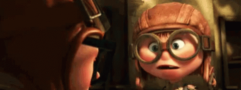 GIF of little Ellie removing her aviator helmet and goggles to show her face to little Carl at the beginning of Pixar's Up.