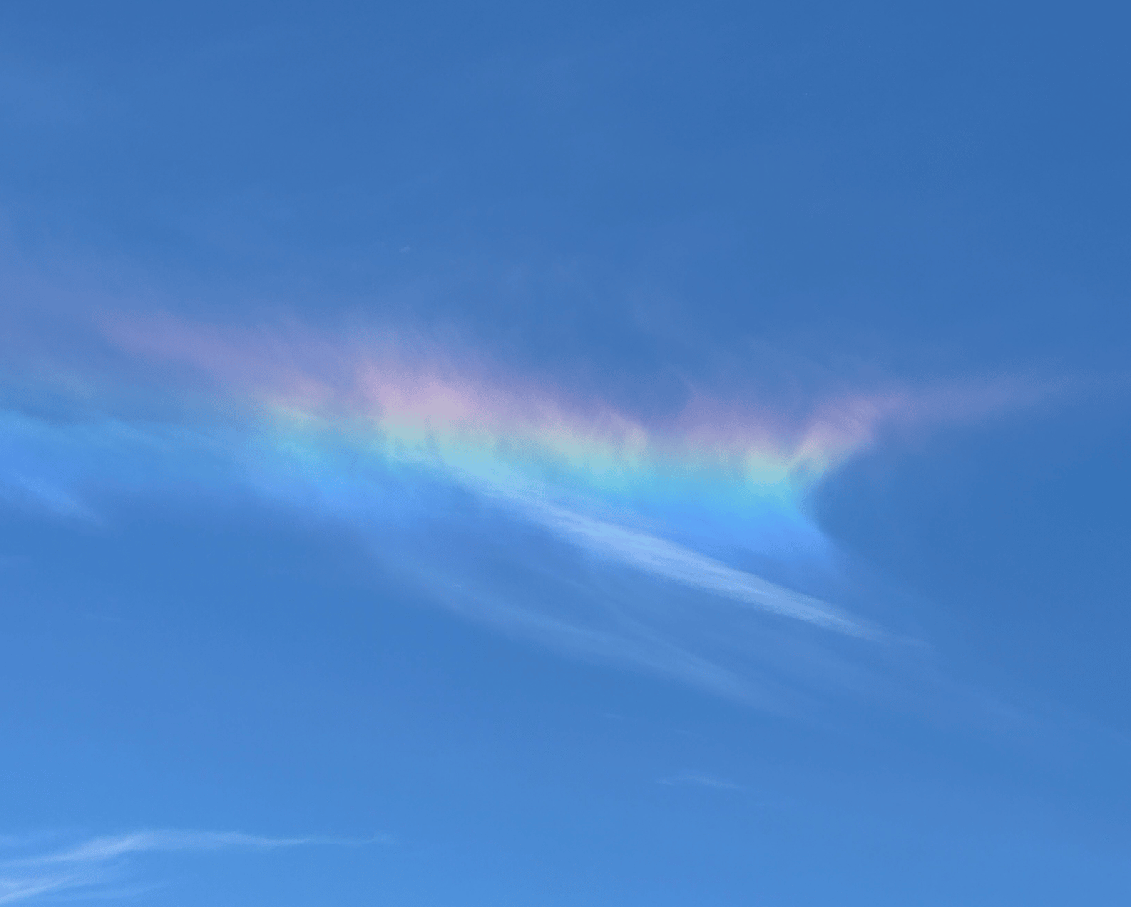 Untouched photo Brett took of a rainbow cloud!