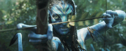 Neytiri from Avatar holds an arrow on a bowstring