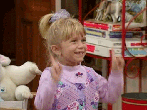 gif of a girl doing a happy dance