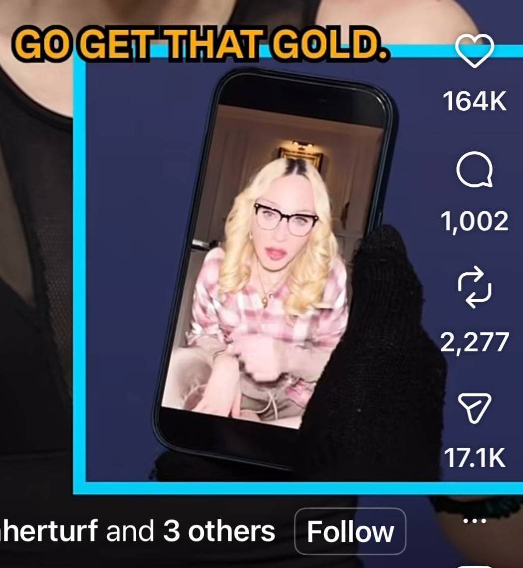 closeup of Madonna wearing glasses