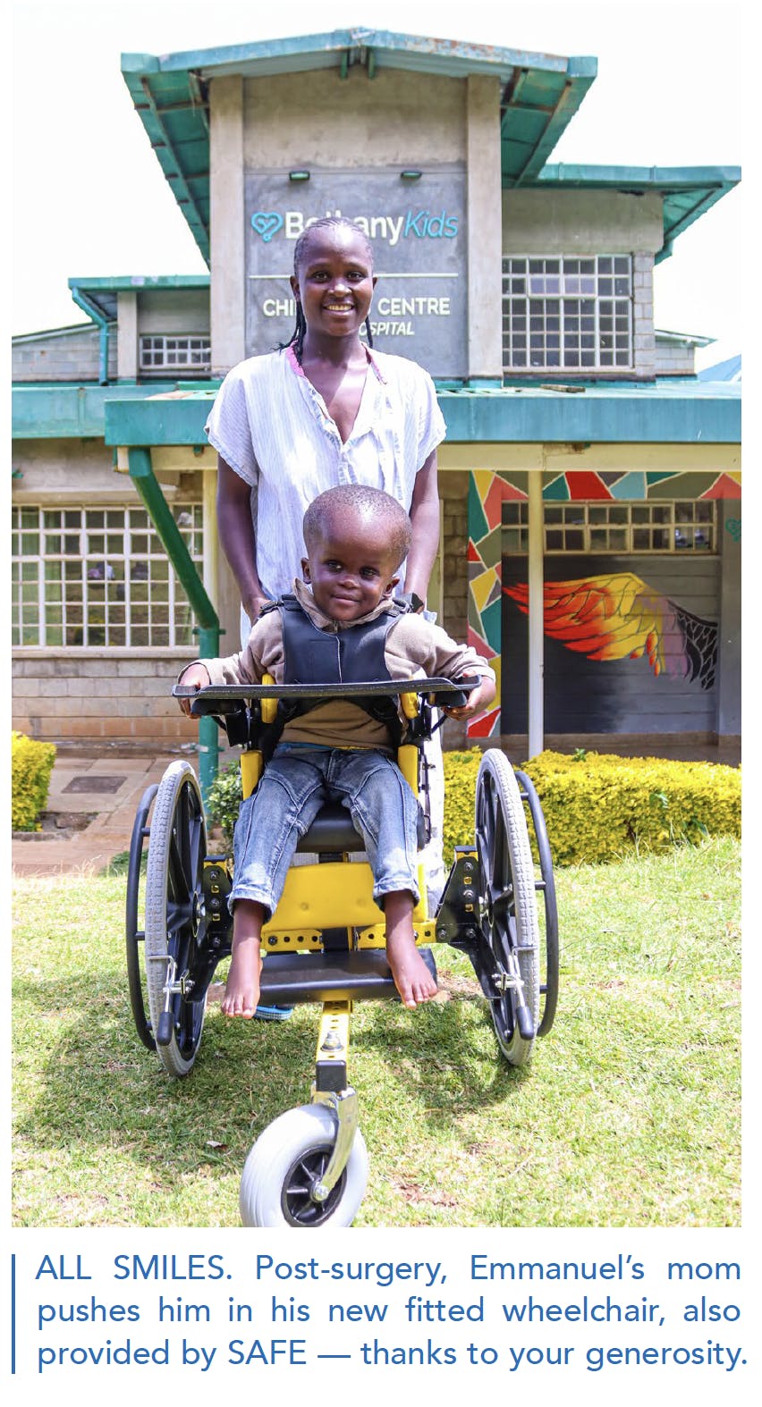A woman is pushing a wheelchair. A child is in the wheelchair. Both are smiling. The caption reads: ALL SMILES. Post-surgery, Emmanuel's mom pushes him in his new fitted wheelchair, also provided by SAFE -- thanks to your generosity.