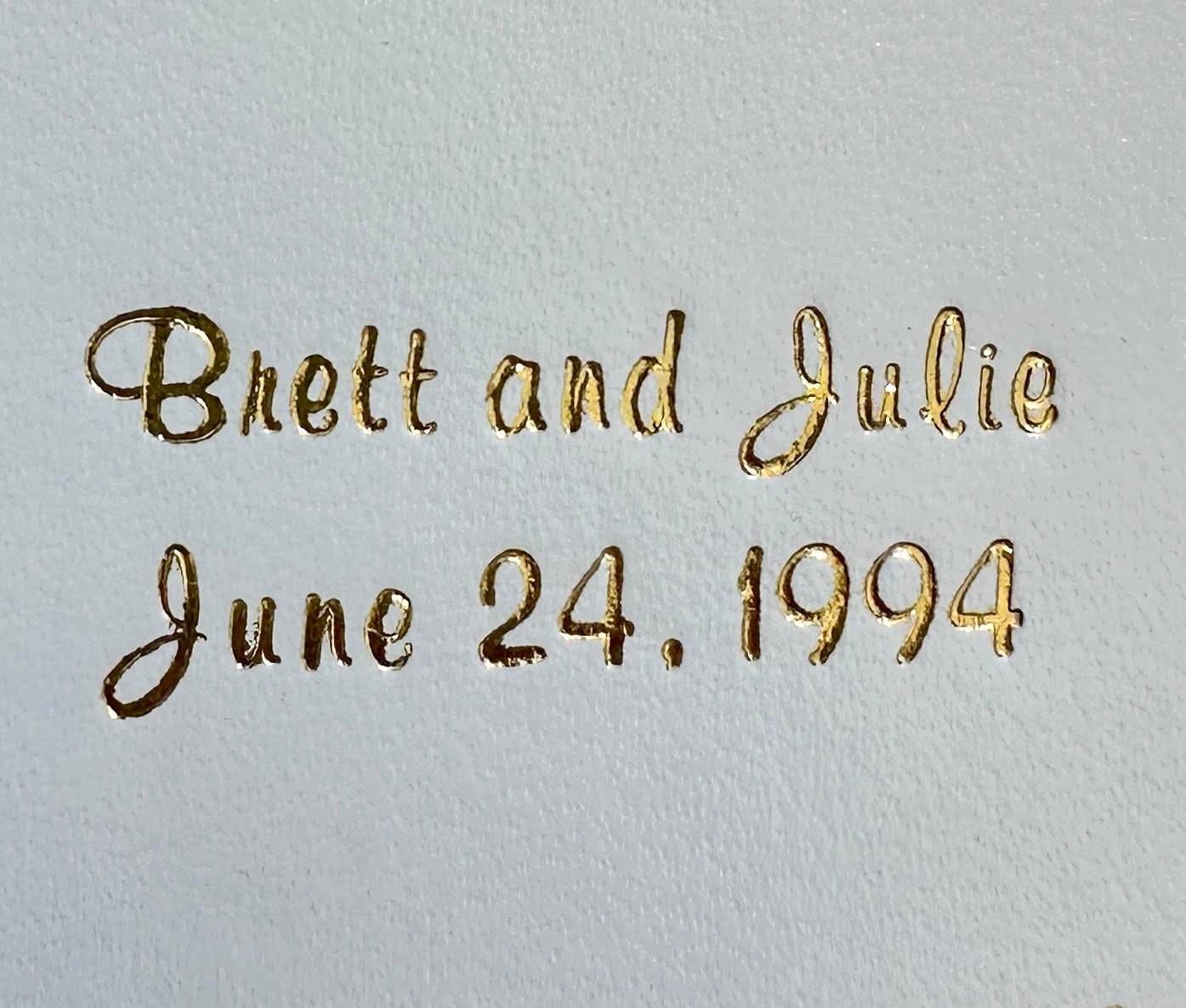 Closeup photo of the inscription from Brett and Julie's wedding photo.