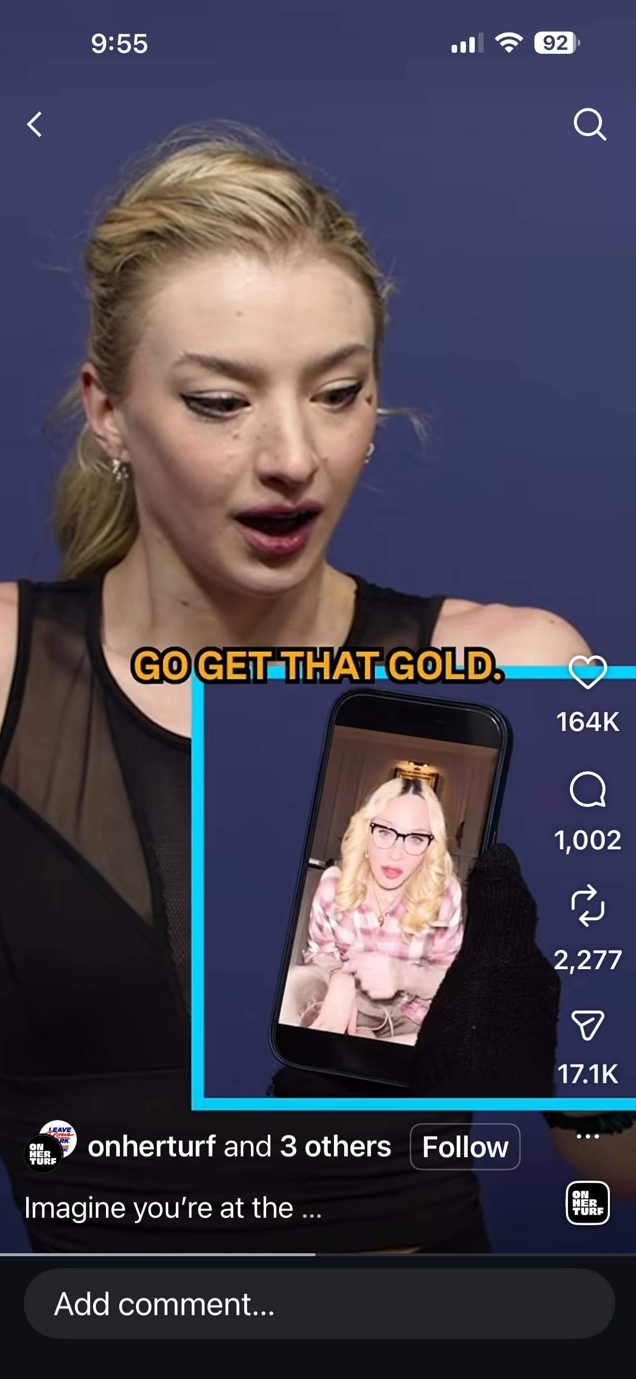 Screenshot of a social media post featuring Madonna wearing glasses.