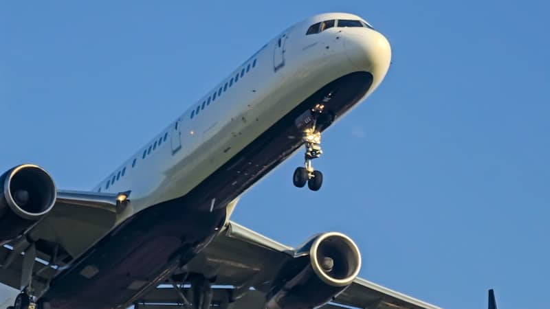 Airplane with landing gear extended approaching