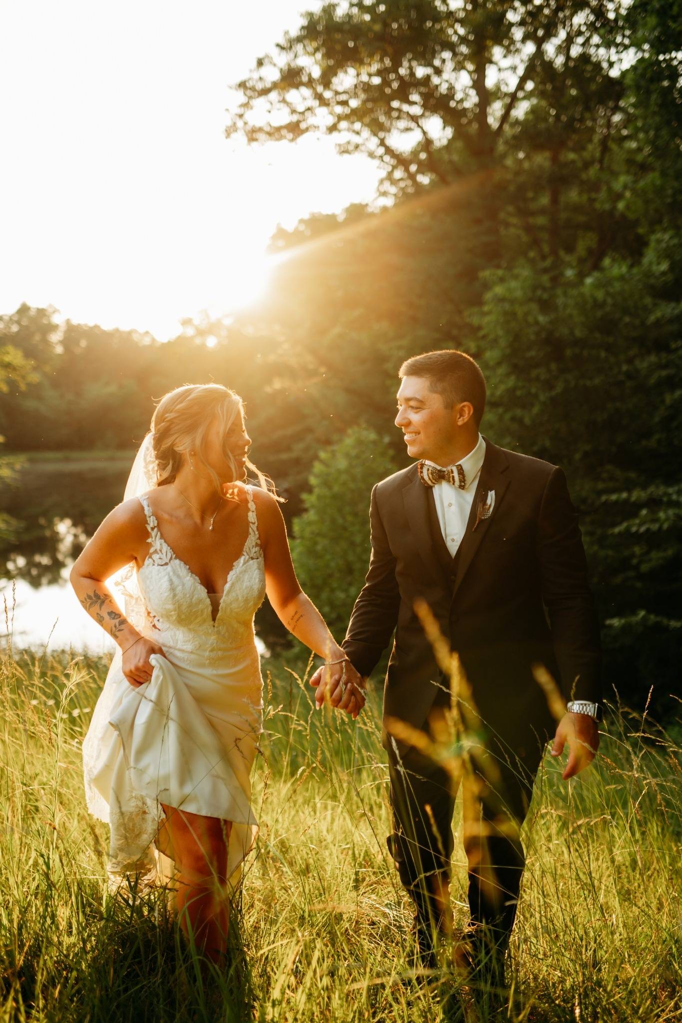 Bride and groom in golden-hour light on the Timber Ridge grounds