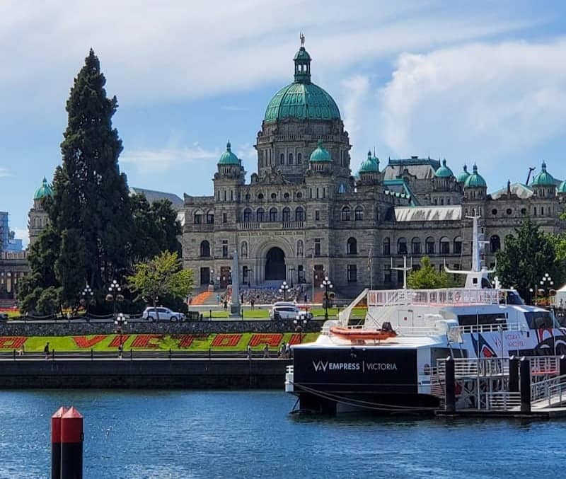 Victoria parliament buildings with ferry docked