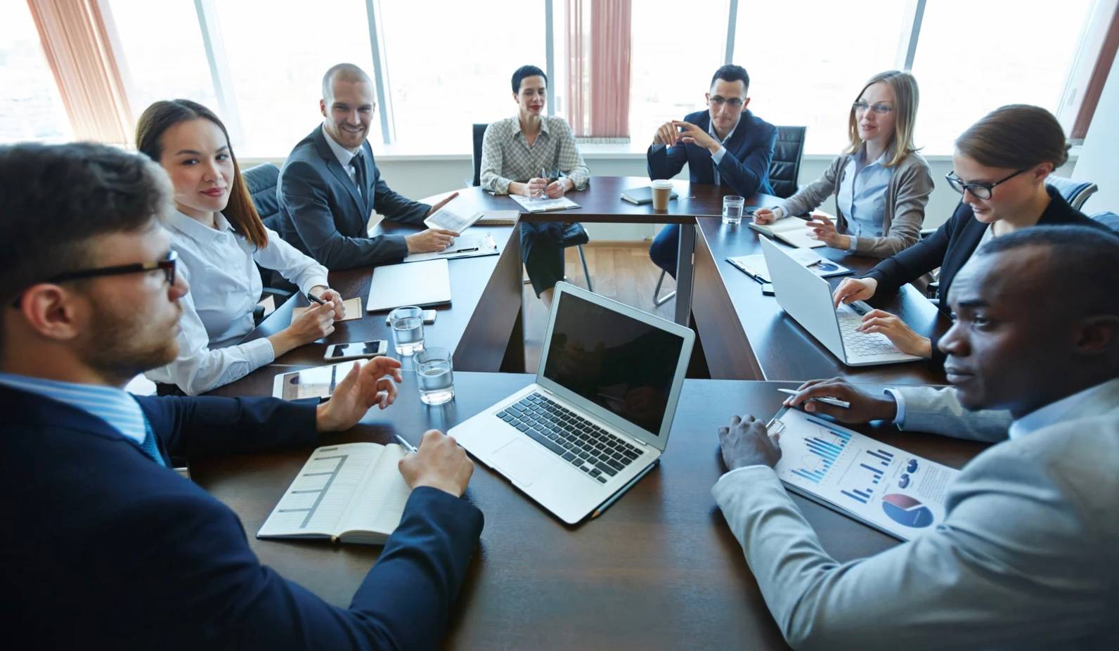 people in a meeting - Talk About Talk