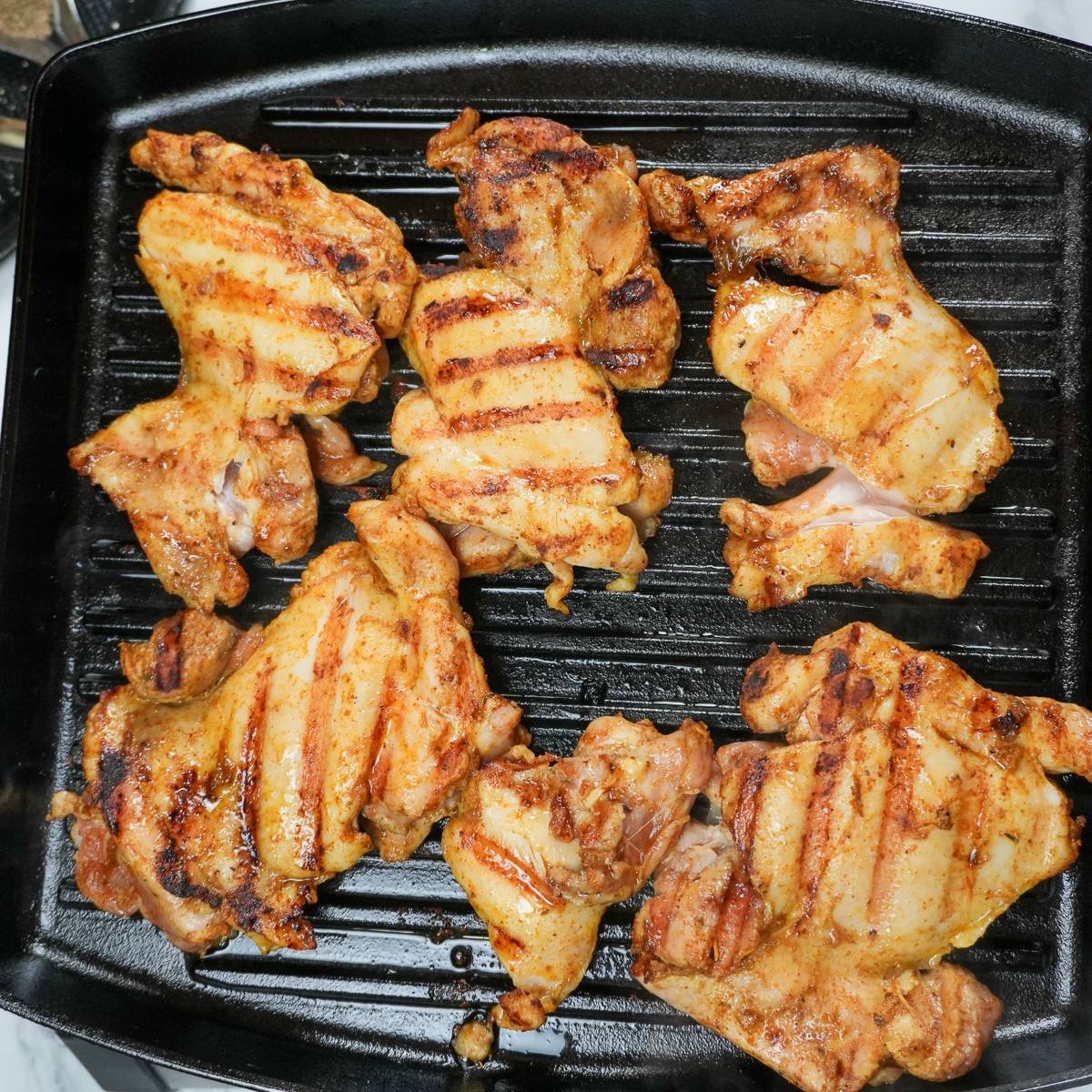 grilled chicken on a grill pan.