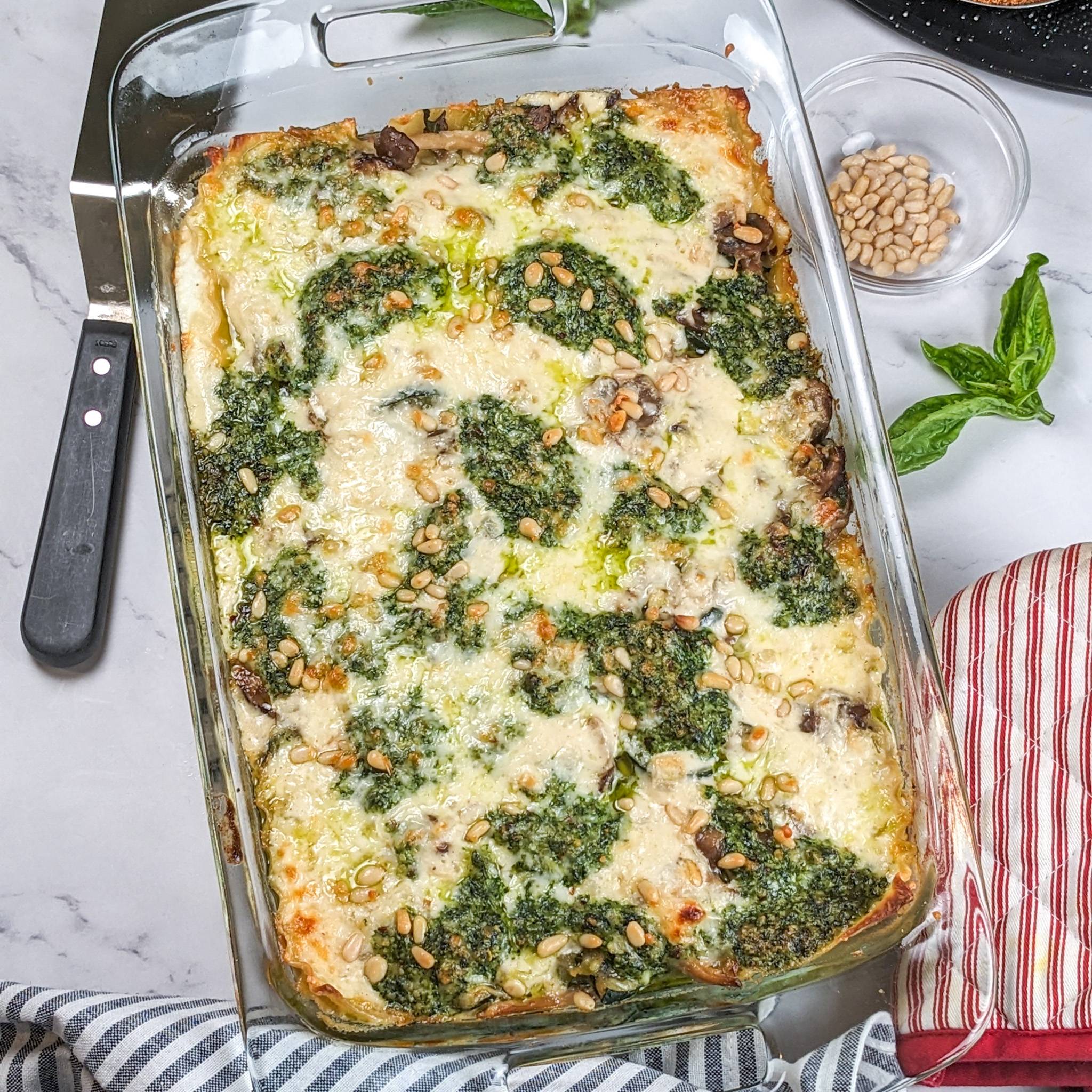 bechamel pesto lasagna in a glass baking dish.