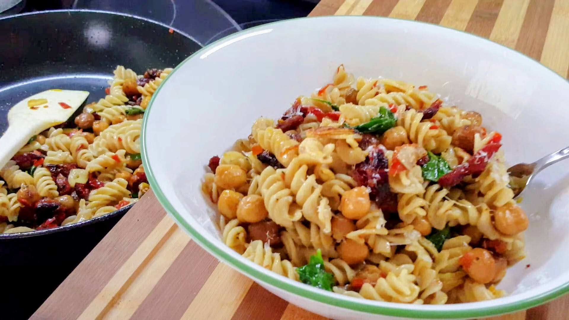 the One-Pan Calabrian Chickpea Pasta Recipe in a wide rim pasta bowl.