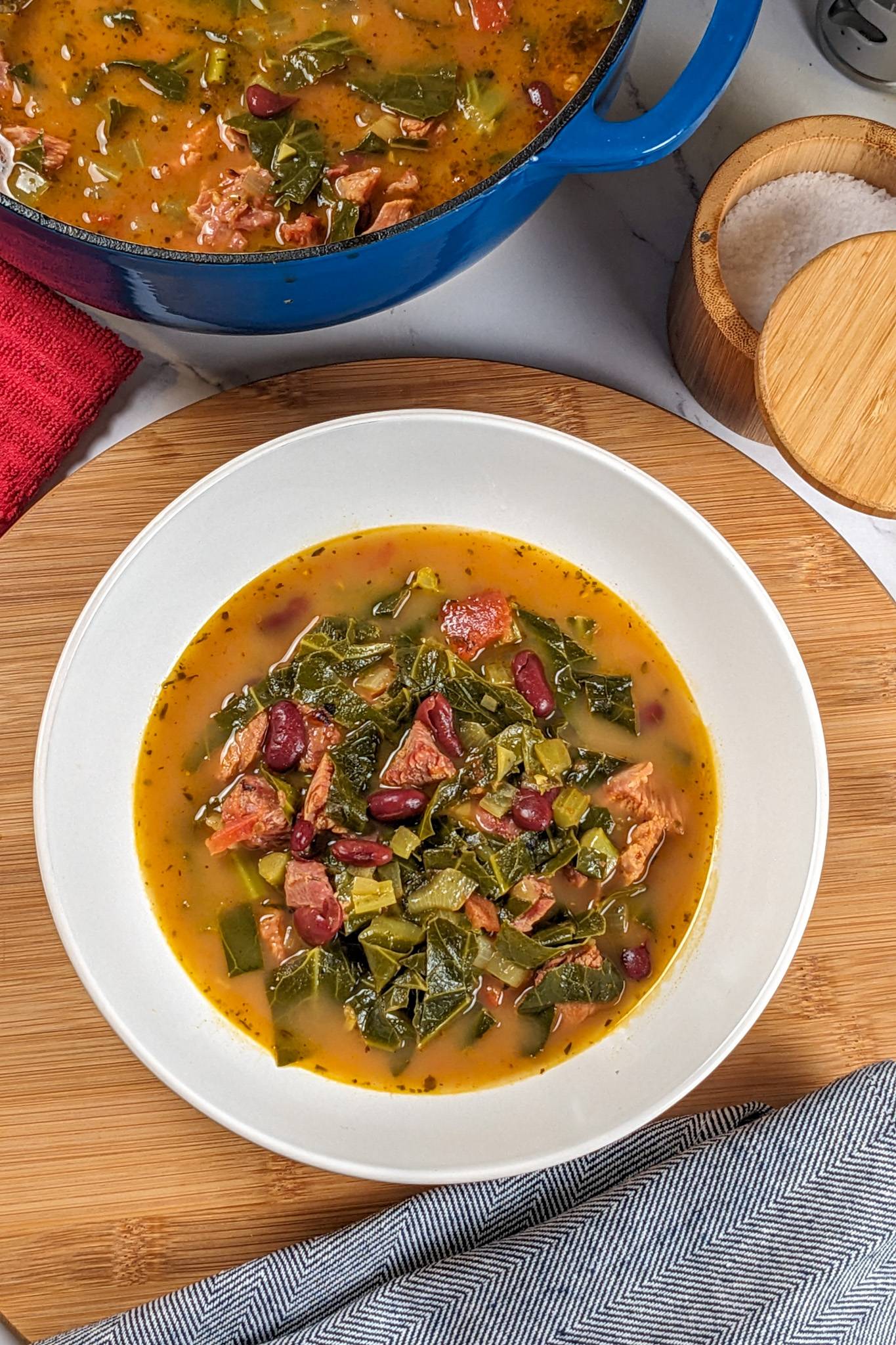 Scotch Bonnet Smoked Turkey Collard Greens Beans Soup in a bowl.