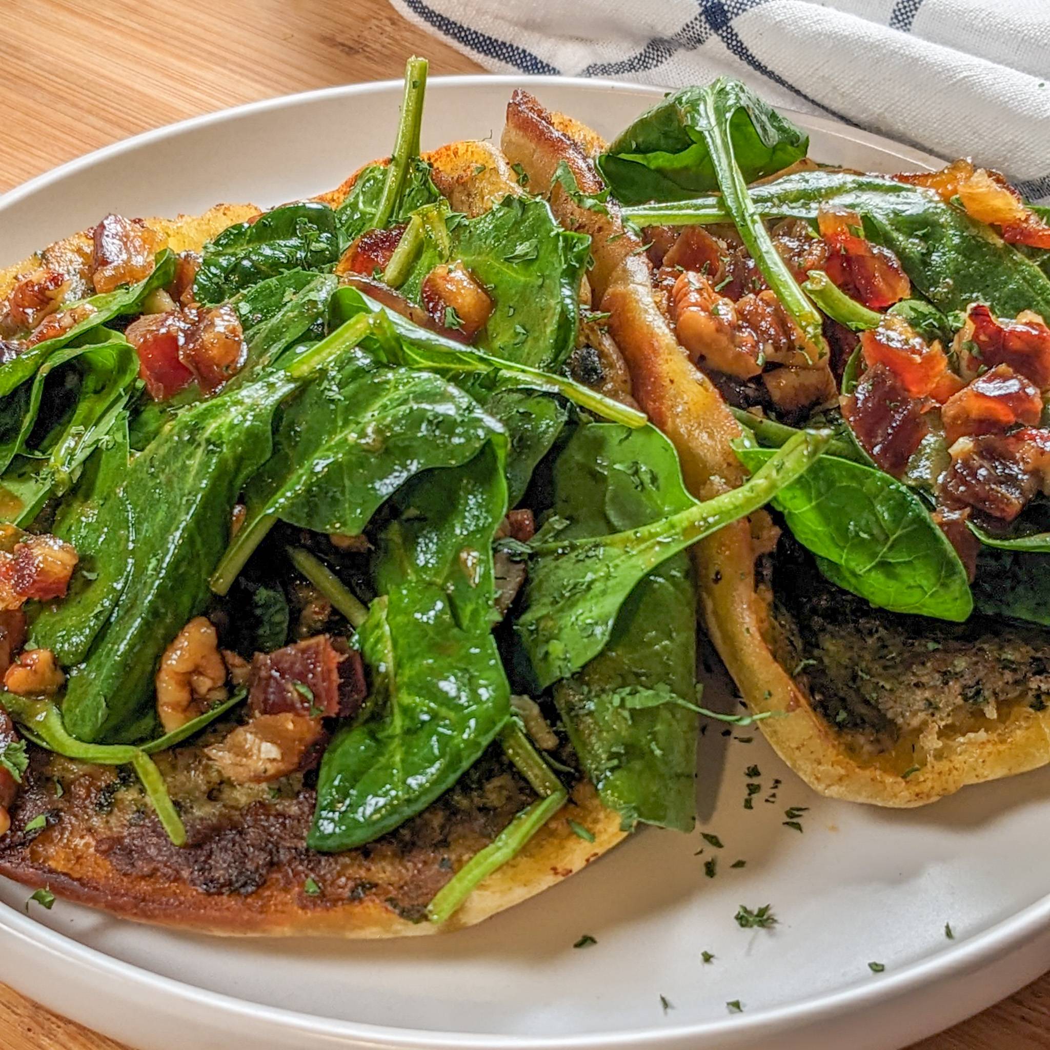 Spicy chicken zhug pita with a fresh baby spinach salad.