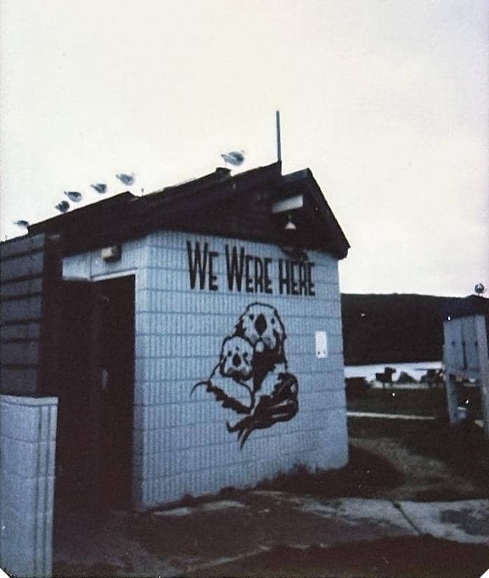 2 seals huddled together with the text We Were Here above them