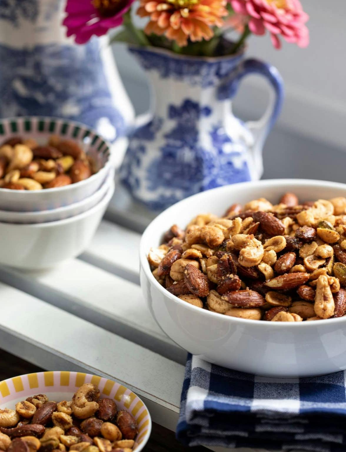 spiced nuts in serving bowls.