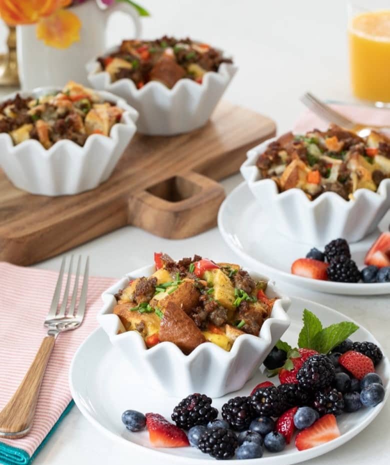spread of Breakfast Strata Cups with berries
