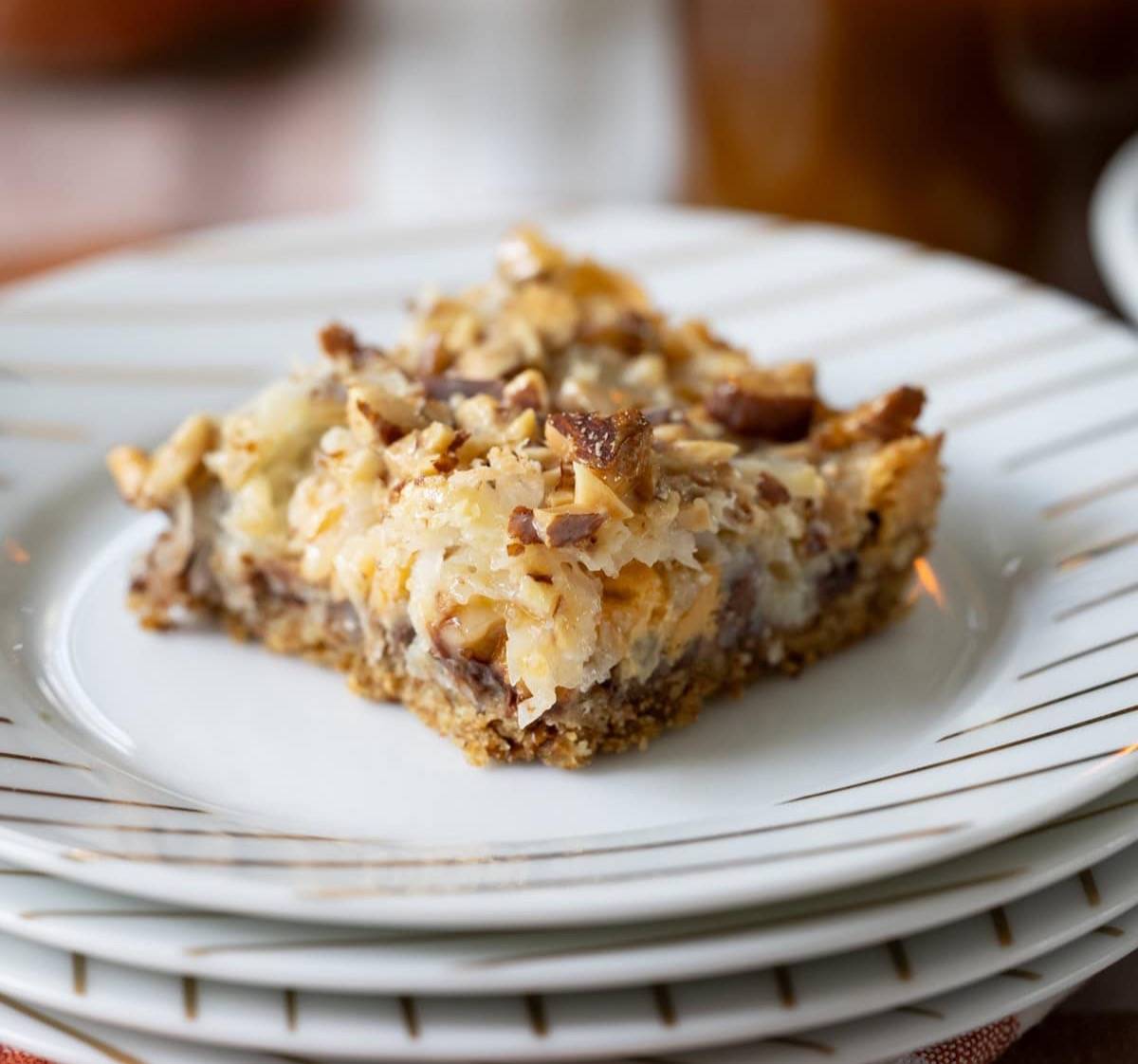 single Kitchen Sink Layer Bar on a stack of white plates.