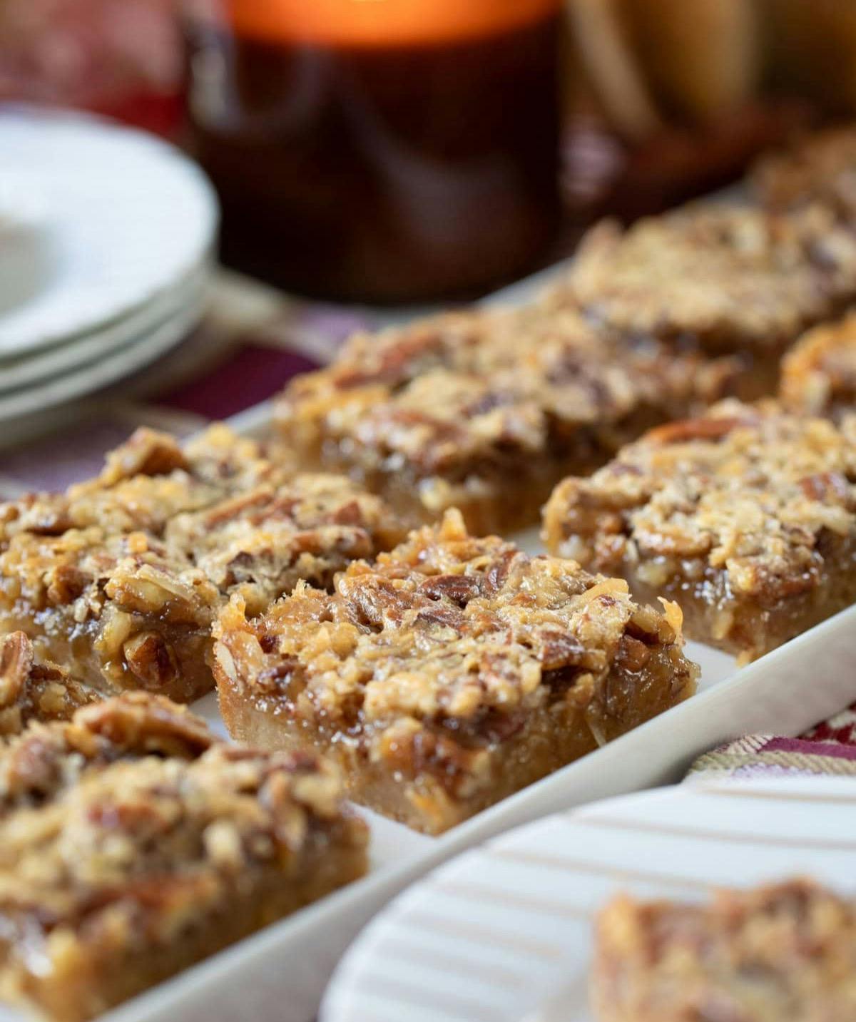 Bourbon Pecan Pie Bars Recipe on a white plate.