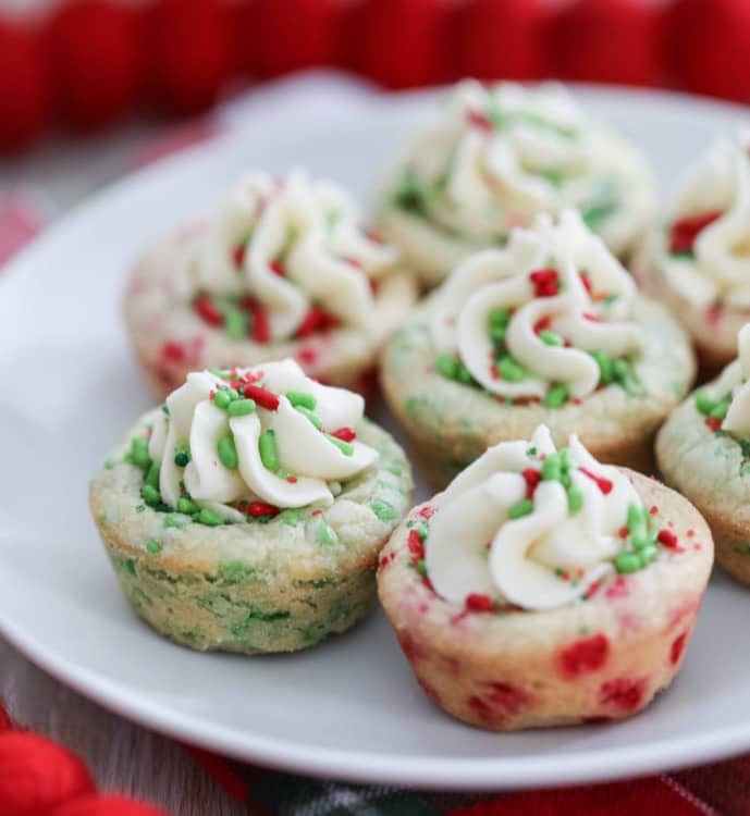 These colorful Christmas Sprinkle Cookie Cups are a delicious and easy to make Christmas Cookie. #christmas #cookie #recipe #dessert #holiday #sprinkles