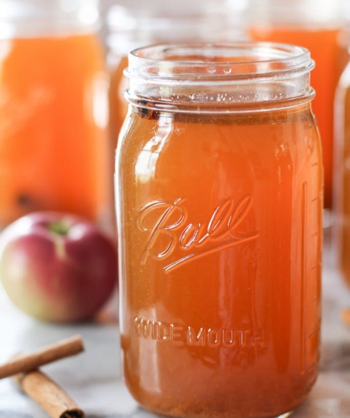 Mason jar filled with apple pie moonshine