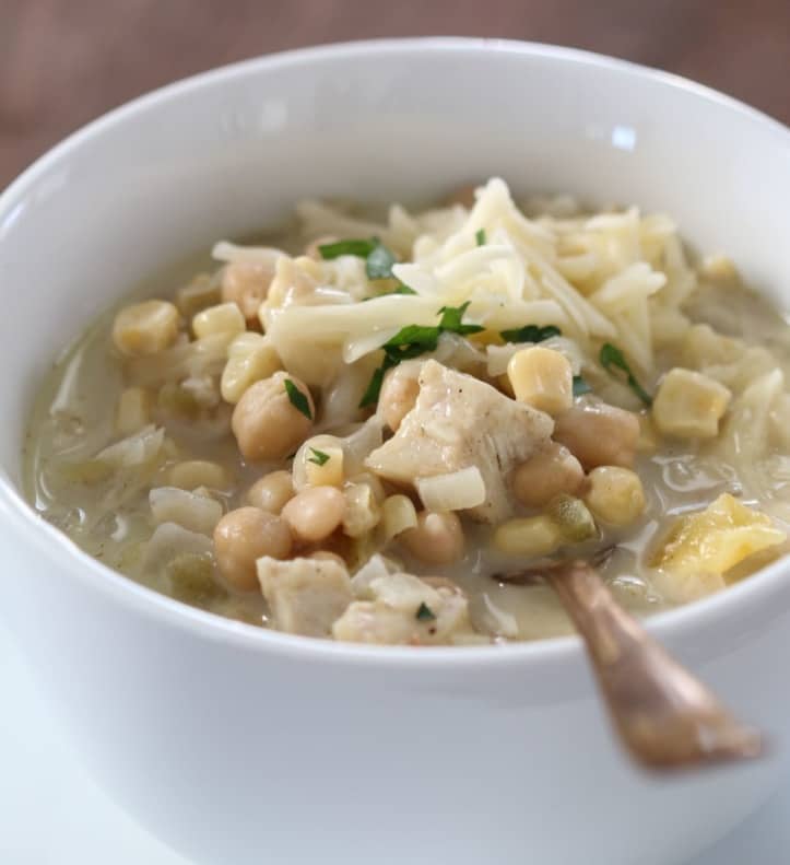 White Chicken Chili in a bowl with a spoon.