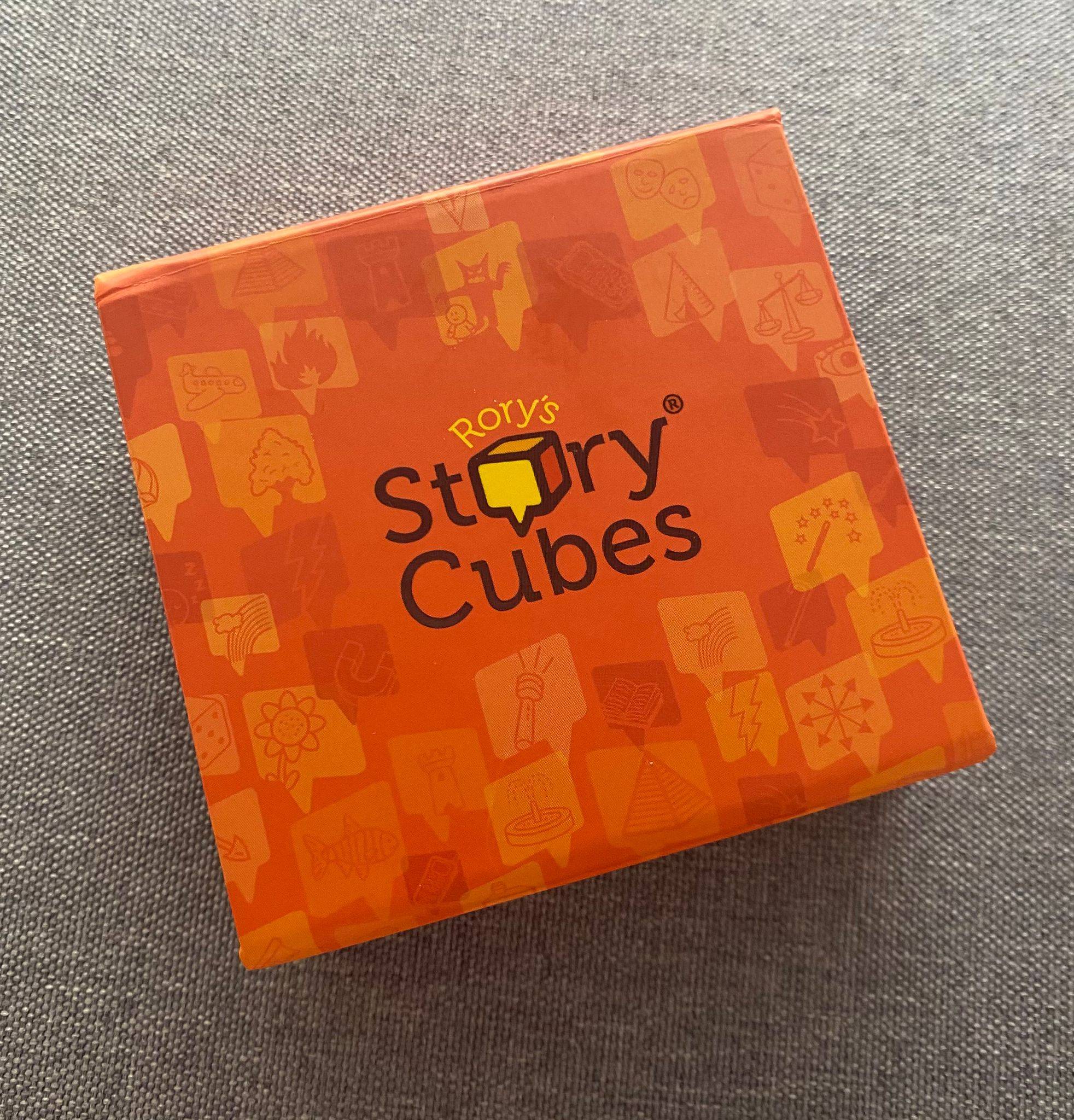 Orange box with the words 'Rorys Story Cubes' written on it.