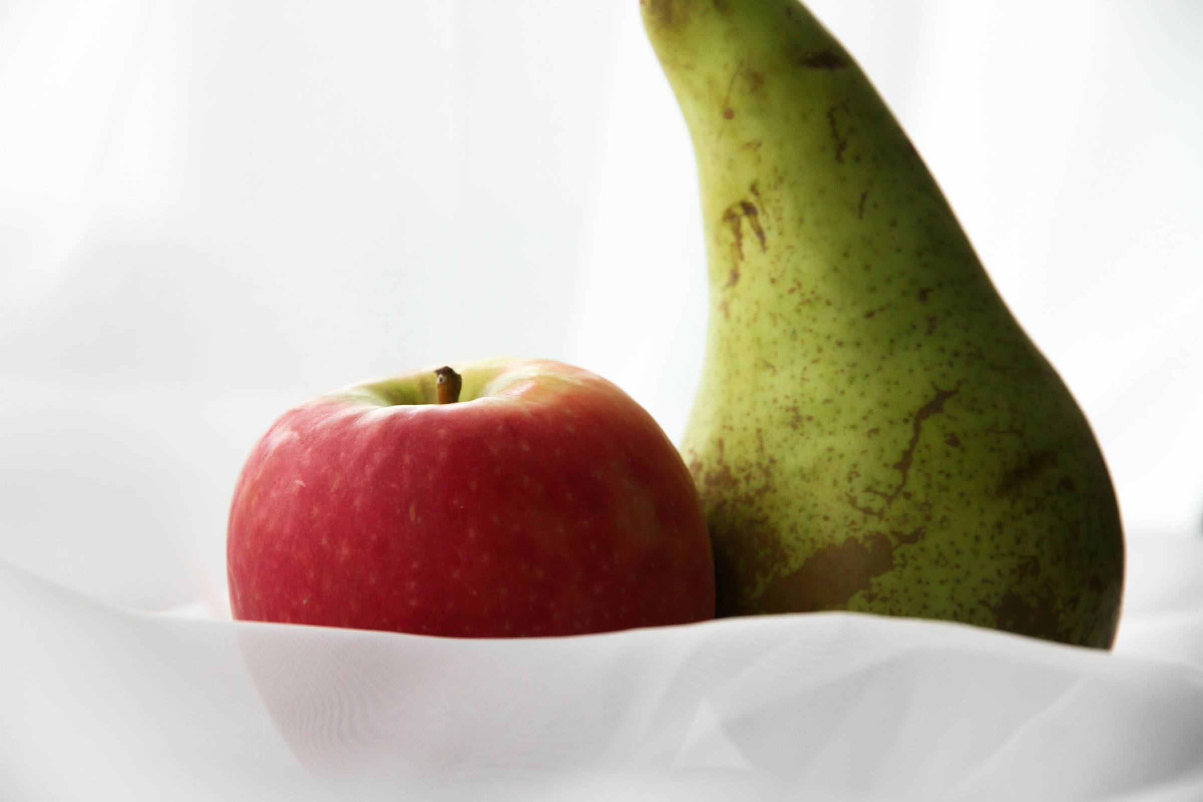 Red Apple and Green Pear.  The metaphor being described is when one it trying to compare difference constructs.  A well known metaphor being Apples and Pears.  Sheela Hobden www.bluegreencoaching.com