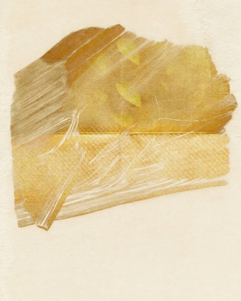 A translucent yellow mineral specimen with layered structure