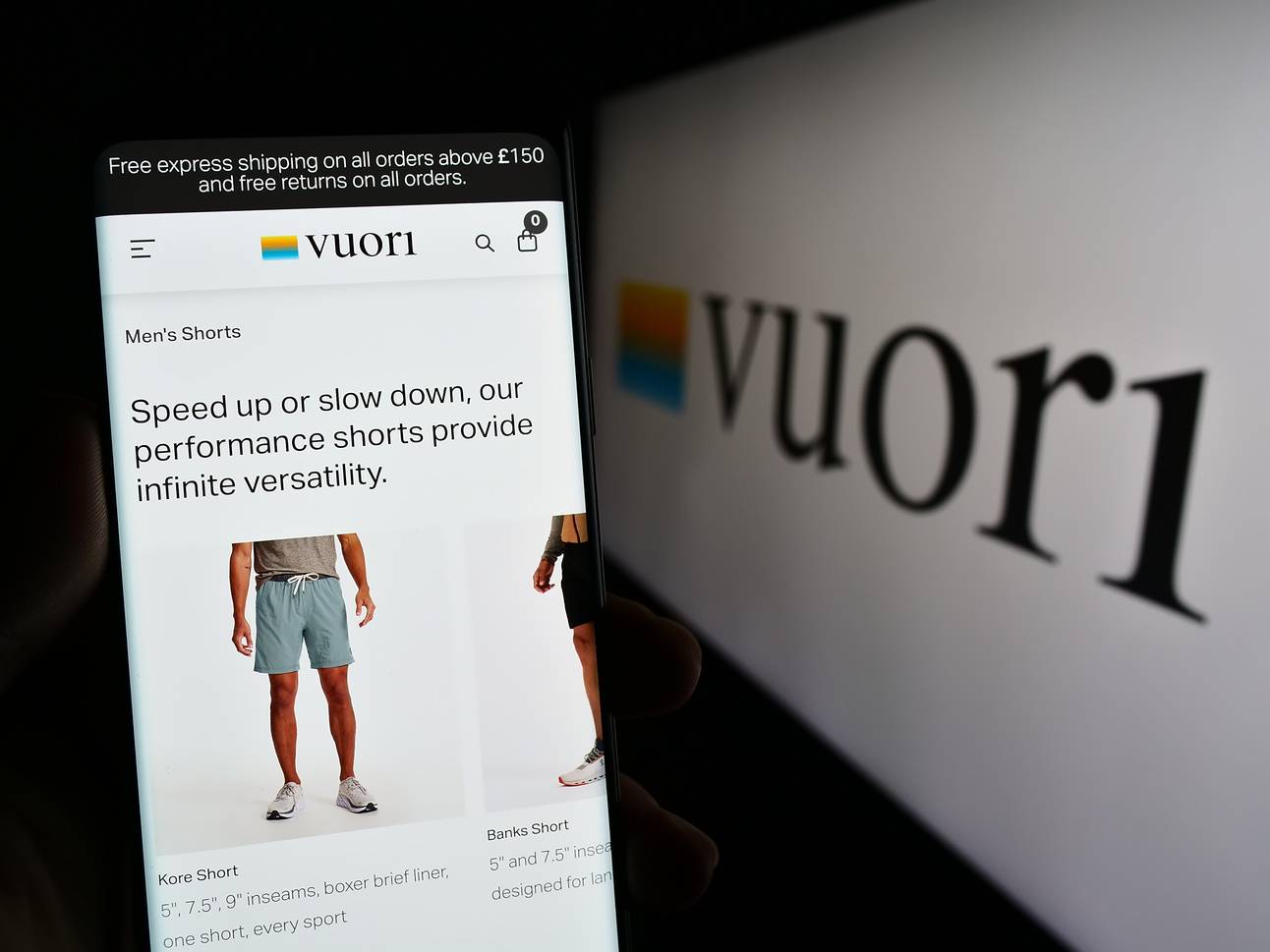 An image of the Vuori website, selling mens yoga shorts